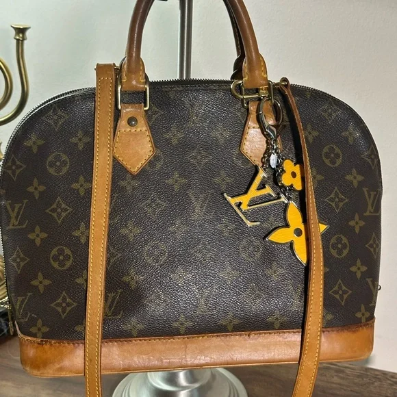 Louis Vuitton Brown and Tan Monogram with strap and keychain charm - Picture 2 of 13